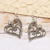 Blue topaz heart dangle earrings, 'Budding Heart' - Blue Topaz and Sterling Silver Heart Shaped Dangle Earrings