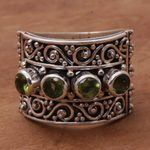 Peridot cocktail ring, 'Lucky Four' - Peridot and 925 Sterling Silver Multi-Stone Ring from Bali