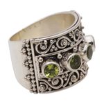 Peridot cocktail ring, 'Lucky Four' - Peridot and 925 Sterling Silver Multi-Stone Ring from Bali