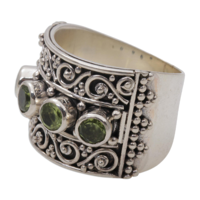 Peridot cocktail ring, 'Lucky Four' - Peridot and 925 Sterling Silver Multi-Stone Ring from Bali