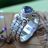 Blue topaz single-stone ring, 'Swirling Serenity' - Blue Topaz Sterling Silver Single-Stone Ring from Indonesia