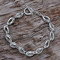 Men's sterling silver link bracelet, 'Shining Novas' - Sterling Silver Men's Link Bracelet from Indonesia