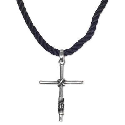 Sterling silver cross necklace, 'True Believer' - Hand Crafted Sterling Silver Cross and Silk Cord Necklace