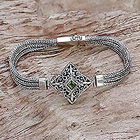 Peridot pendant bracelet, 'Star Guidance' - Hand Crafted Bali Style Sterling Silver and Peridot Bracelet