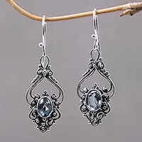 Blue topaz dangle earrings, 'Sigh' - Bali Artisan Jewelry Blue Topaz Sterling Silver Earrings