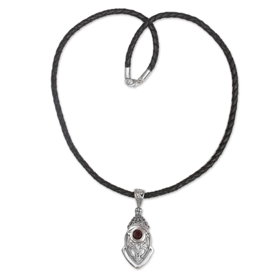 Garnet pendant necklace, 'Bali Amulet in Red' - Sterling Silver and Garnet Pendant Necklace from Indonesia