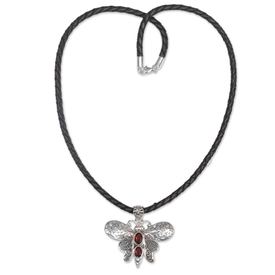 Garnet pendant necklace, 'Bali Moth in Red' - Garnet and Leather Moth Pendant Necklace from Indonesia