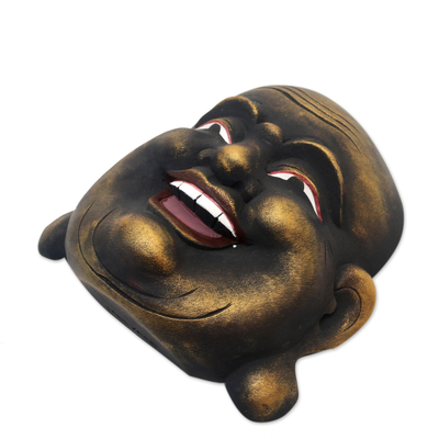 Máscara de madera - Máscara de pared de madera dorada de un Buda balinés que ríe