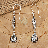 Blue topaz dangle earrings, 'Blue Nirvana' - Blue Topaz and Sterling Silver Dangle Earrings from Bali