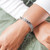 Onyx cuff bracelet, 'Black Dewdrops' - Onyx and Sterling Silver Cuff Bracelet from Indonesia