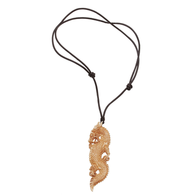Bone pendant necklace, 'Thorny Dragon' - Bone and Leather Dragon Pendant Necklace from Indonesia