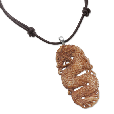 Bone pendant necklace, 'Snarling Dragon' - Bone and Leather Dragon Pendant Necklace from Indonesia
