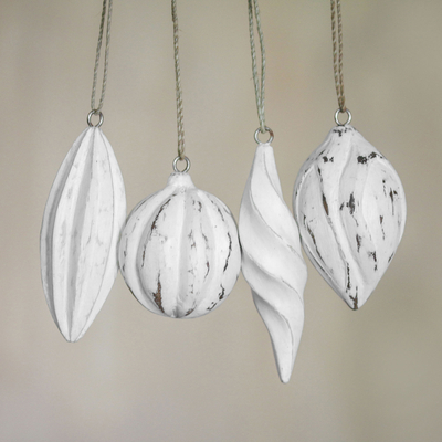 Wood ornaments, 'Holiday Ambassadors' (set of 4) - Four White Distressed Albesia Wood Ornaments from Bali