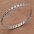 Sterling silver bangle bracelet, 'Woven Twine' - Sterling Silver Braided Bangle Bracelet from Indonesia (image 2b) thumbail