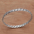 Sterling silver bangle bracelet, 'Woven Twine' - Sterling Silver Braided Bangle Bracelet from Indonesia (image 2c) thumbail