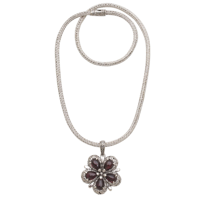 Garnet pendant necklace, 'Bougainvillea Flower' - Garnet and Sterling Silver Floral Pendant Necklace from Bali