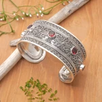Garnet cuff bracelet, 'Uluwatu Altar' - Balinese Sterling Silver Cuff Bracelet with Garnet 3.5 Cts