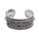 Garnet cuff bracelet, 'Uluwatu Altar' - Balinese Sterling Silver Cuff Bracelet with Garnet 3.5 Cts