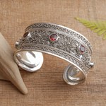 Garnet cuff bracelet, 'Uluwatu Altar' - Balinese Sterling Silver Cuff Bracelet with Garnet 3.5 Cts