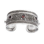 Garnet cuff bracelet, 'Uluwatu Altar' - Balinese Sterling Silver Cuff Bracelet with Garnet 3.5 Cts