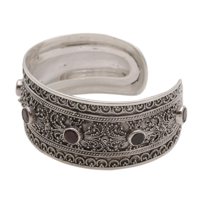 Garnet cuff bracelet, 'Uluwatu Altar' - Balinese Sterling Silver Cuff Bracelet with Garnet 3.5 Cts