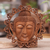 Suar wood wall panel, 'Buddha Face' - Hand Carved Buddha Face Wall Panel with Floral Engravings