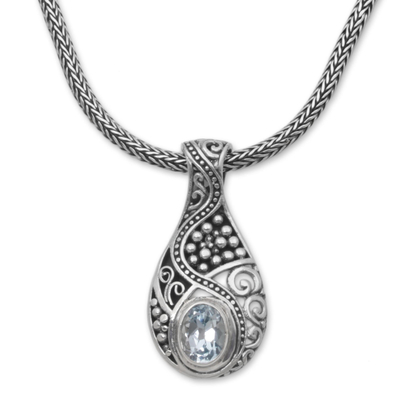 Blue topaz pendant necklace, 'Patterns of the World' - Blue Topaz and Sterling Silver Pendant Necklace from Bali