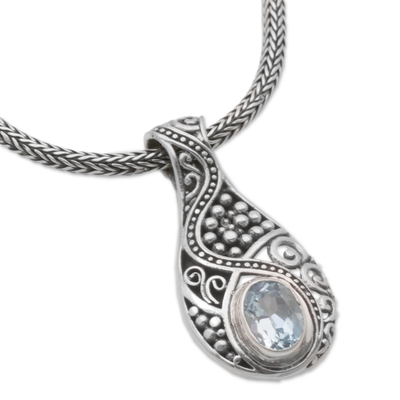 Blue topaz pendant necklace, 'Patterns of the World' - Blue Topaz and Sterling Silver Pendant Necklace from Bali