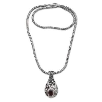 Garnet pendant necklace, 'Patterns of the World' - Garnet and Sterling Silver Drop Pendant Necklace from Bali