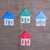 Wood ornaments, 'Festive Home' (set of 4) - Four Albesia Wood Distressed House Ornaments from Bali