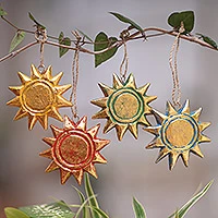 Wood ornaments, 'Sunny Holiday' (set of 4) - Four Gold Tone Albesia Wood Sun Ornaments from Bali