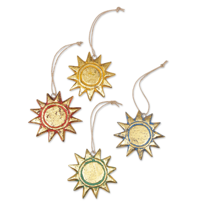 Wood ornaments, 'Sunny Holiday' (set of 4) - Four Gold Tone Albesia Wood Sun Ornaments from Bali