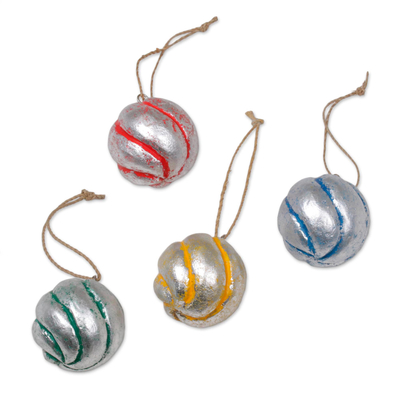 Wood ornaments, 'Festive Spirals' (set of 4) - Four Round Silver Tone Albesia Wood Ornaments from Bali