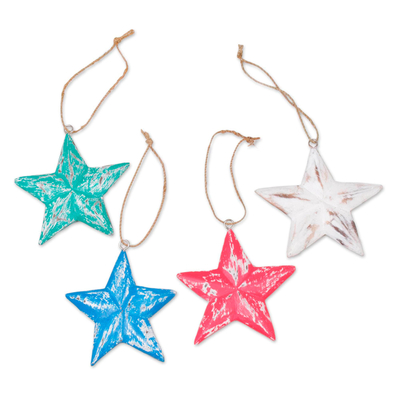 Wood ornaments, 'Multicolored Stars' (set of 4) - Four Multicolored Albesia Wood Star Ornaments from Bali