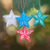 Wood ornaments, 'Multicolored Stars' (set of 4) - Four Multicolored Albesia Wood Star Ornaments from Bali (image 2b) thumbail