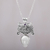 Amethyst pendant necklace, 'Janger Solo' - Amethyst and Bone Pendant Necklace by Balinese Artisans (image 2) thumbail