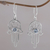 Blue topaz dangle earrings, 'Hamsa Swirls' - Blue Topaz and Sterling Silver Hamsa Hand Dangle Earrings thumbail