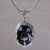 Onyx pendant necklace, 'Bird Watching' - Onyx and Sterling Silver Bird Pendant Necklace from India thumbail