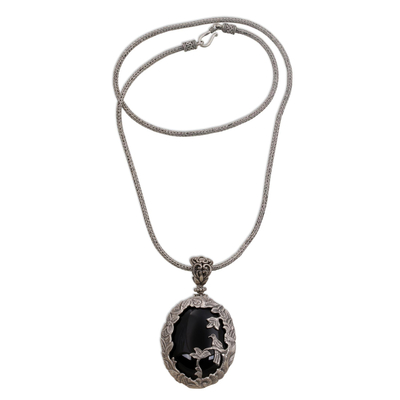 Onyx pendant necklace, 'Bird Watching' - Onyx and Sterling Silver Bird Pendant Necklace from India