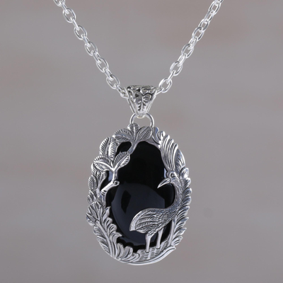 Onyx pendant necklace, 'Wading Heron' - Onyx and Sterling Silver Heron Pendant Necklace from Bali