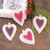 Wood ornaments, 'Ruby Hearts' (set of 4) - Set of Four Painted Wood Heart Ornaments from Bali thumbail