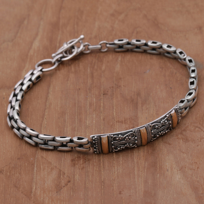 Sterling silver and gold accent bracelet, 'Holy Dimension' - Sterling Silver Link Bracelet with Gold Accents from Bali