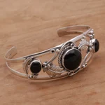 Onyx cuff bracelet, 'Night Leaves' - Onyx and Sterling Silver Leafy Cuff Bracelet from Bali