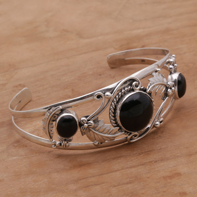 Onyx cuff bracelet, 'Night Leaves' - Onyx and Sterling Silver Leafy Cuff Bracelet from Bali