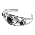 Onyx cuff bracelet, 'Night Leaves' - Onyx and Sterling Silver Leafy Cuff Bracelet from Bali