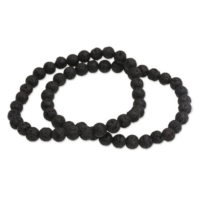 Lava stone beaded stretch bracelets, 'Moon Circles' (pair) - Pair of Beaded Lava Stone Stretch Bracelets from Bali