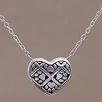 Sterling silver pendant necklace, 'Puppy Heart' - Sterling Silver Paw Print Pendant Necklace from Bali