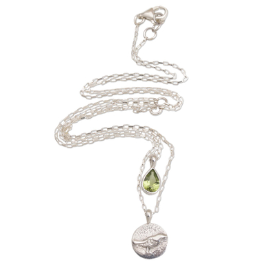 Peridot pendant necklace, 'Freedom Wings' - Peridot and Sterling Silver Bird Necklace from Bali