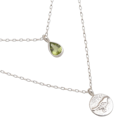 Peridot pendant necklace, 'Freedom Wings' - Peridot and Sterling Silver Bird Necklace from Bali