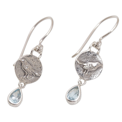Blue topaz dangle earrings, 'Wistful Birds' - Blue Topaz and Sterling Silver Bird Earrings from Bali